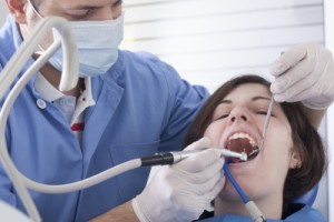 woman getting dental exam